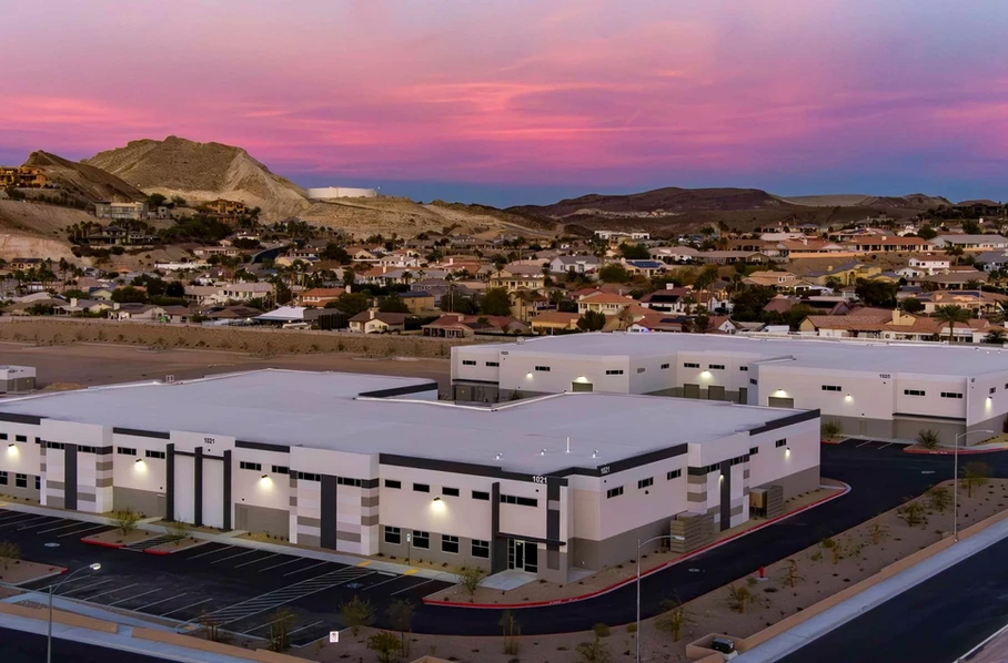 Aerial dusk view of the Nevatronix headquarters and distribution facility in the Las Vegas foothills